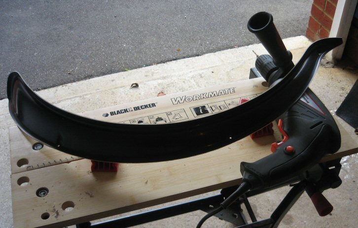 Drilling holes in the wheel arches